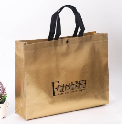 China Recyclable Custom Gold Shiny Laminated Non Woven Shopping Bag Boutique Shopping Tote Bag for sale