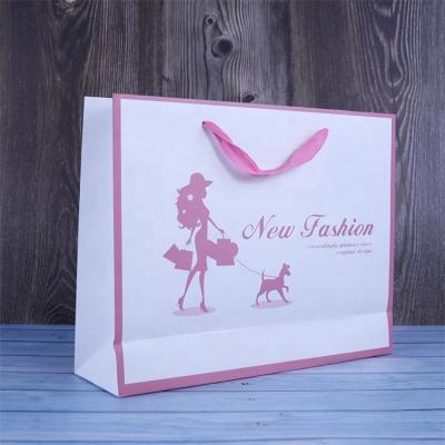 China Eco Friendly Custom Luxury Garment Clothing Shopping Packaging Paper Bag With Logo Print for sale