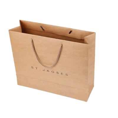 China Luxury custom printed logo shopping paper kraft bag for glass bottles for sale