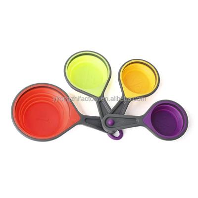 China Viable Wholesale Silicone Collapsible Measuring Tools 4-Piece Measuring Cups And Spoons Set For Cooking And Baking for sale