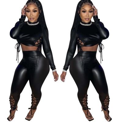 China Sustainable Women's Clothing 2021sexy Two Piece Crop Top PU Bandage Long Sleeve Luxury Leather Women Sets for sale