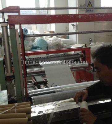 China Hospital Disposable flat paper bed sheet roll / couch roll perforated lines for sale