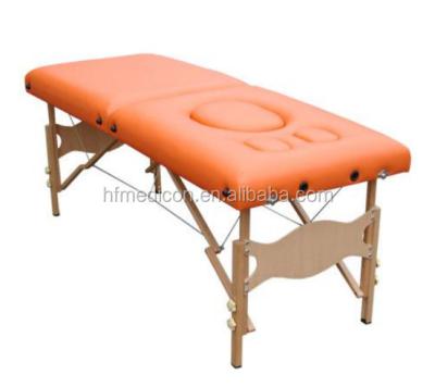 China Pregnant massage table wooden massage table for pregnant women à venda