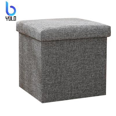 China New Modern Design Yolo Design Foot Stools Ottoman Storage Stool Foldable Nonwoven Folding Living Room Storage Stool for sale