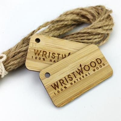 China Sustainable Customized Logo In Wooden Style Bamboo Hang Tags For T Shirts for sale