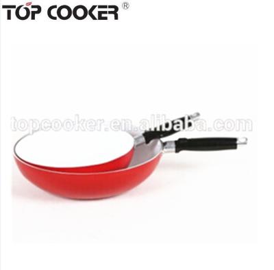 China Durable Pressed Ceramic Coating Wok With Stainless Steel Handle for sale