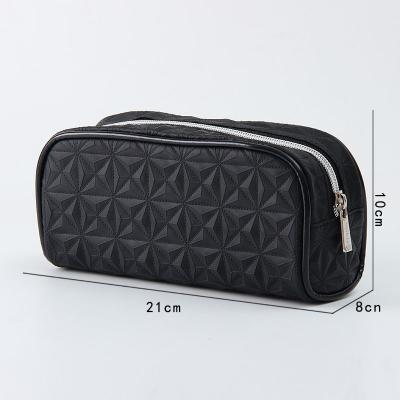 China Durable Wholesale Custom Vertical Large Capacityunisex Makeup Products Travel Black Cosmetic Bag for sale