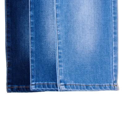 China 10.2oz before wash High elasticity thick denim fabric for autumn and winter clothes pants for sale