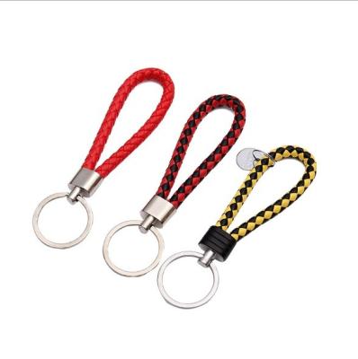 China Cheap creative cute female models leather rope lock car keychains ball key chain for sale