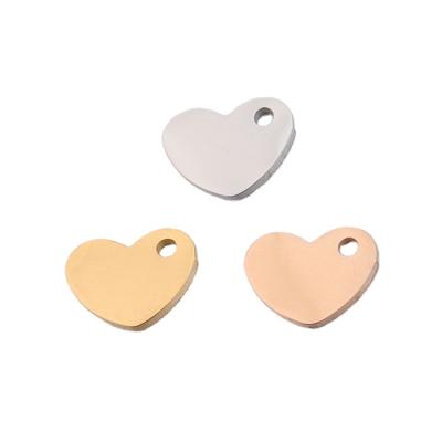 China DIY 7.5*10mm Custom Single Hole Mirror Polished Stainless Steel Love Heart Pendant Charms for sale