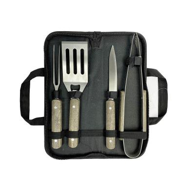 China Easily cleaned barbecue set includes 5 pieces of barbecue tool kit with spatula, fork and wooden handle for sale