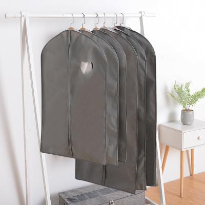 China Modern Hollow Non-woven Bag Cover Dust Cover Dustproof Moistureproof Coat Thickened Bag Clothes Hanging Dust Cover For Clothes for sale