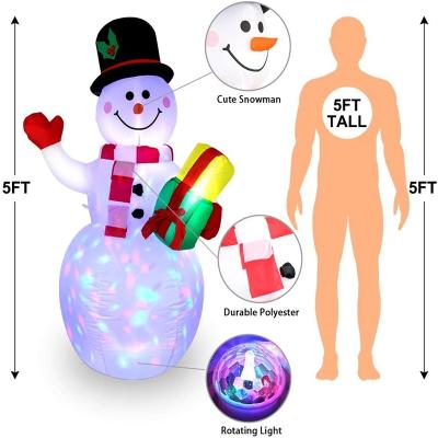 China Hot Selling 1.2 Inflatable Outdoor Indoor Christmas Decoration Home Christmas New Year Snow Globe Inflatable Snowman And Three Cute Penguins Around for sale