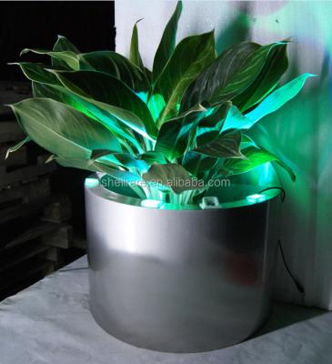 China Modern outdoor stainless steel planter flower pots in cone shape , LED metal vase planter for sale