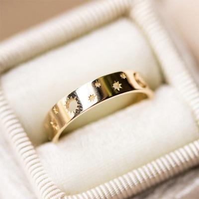 China Cute Hollow Ring Gold Unisex Fashion Simple Moon Star Ring for sale