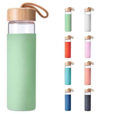 China Yomious Viable 20 Ounce Borosilicate Glass Water Bottle with Bamboo Lid and BPA Free Silicone Sleeve for sale