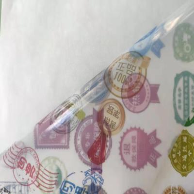 China Self-adhesive dye and dye wholesale price PET label paper a4 transparent luminous transparent sticker paper for sale