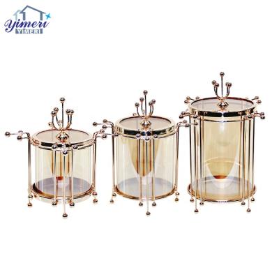 China Storage Food Customize Glass Metal Pedestal Amber Chocolate Candy Storage Jar With Lid for sale