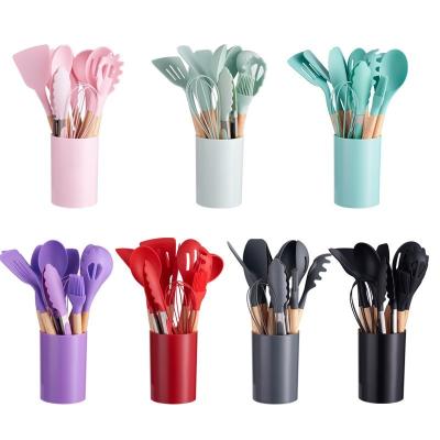 China Sustainable High End Best Selling 12PCS Silicone Kitchen Utensils Sets Cooking Gadgets With Plastic Holder for sale