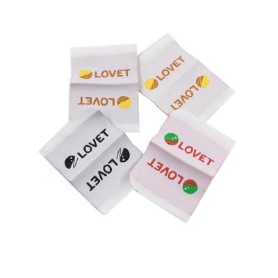 China Sustainable Custom Sewing Labels Apparel Tags And Labels Woven Center Fold Label for sale