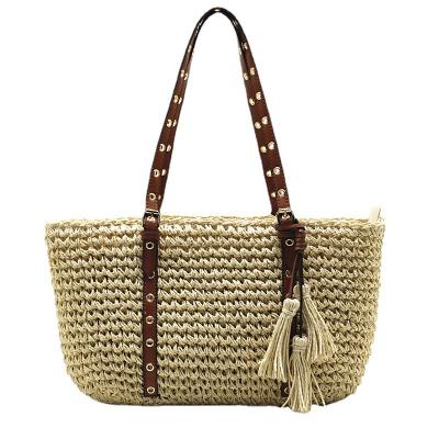 China Other 2022 Large Capacity Casual Papyrus Woven Travel Hot Selling Female Purse Women Tassels Handbags Summer Beach Totes Straw Bags for sale