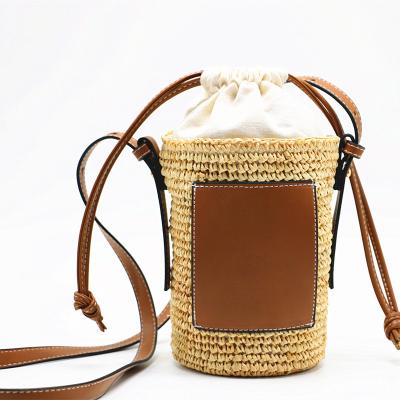 China Designer Woven Shoulder Bag Designer Straw Bag Top Handle Handbags Handmade Raffia Bucket Luxury Summer Vacation Casual Bags For Woman for sale