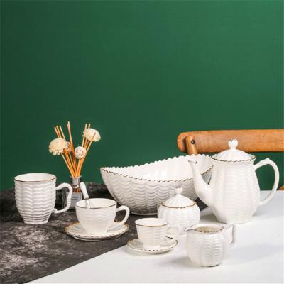 China Sustainable Wholesale British Style Modern Design Fine Bone China Embossed Pattern White Porcelain Tea Set for sale