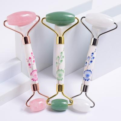 China 100% Jade Face Lift Jade Facial Roller Natural Flower Facial Ceramic Facial Massager Rod Rose Quartz Facial Jade Anti Aging Slimming Roller for sale