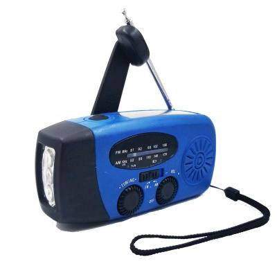 China 2020 FM/AM PORTABLE Outdoor Solar Hand Crank Dynamo Emergency Flashlight Radio Phone Charge for sale