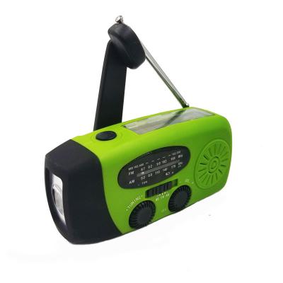 China Multi-Functional LED Light LED Flashlight Emergency Solar Hand Crank AM/FM Self-Powered WB Time Radio for sale