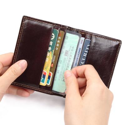 China Vintage 100% Leather Card Holder For Men Women Card Clips Small Pocket Business Card Case R-8078C for sale