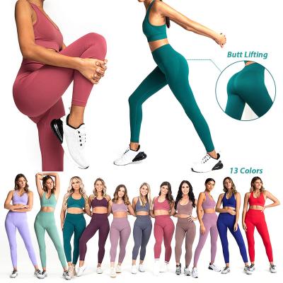 China Affordable Hot Selling Gym Wear Sexy Knitted Seamless Yoga Set For Women 2 Pcs Fitness Waist Top Back Bra Sporty Gaiters Runner for sale