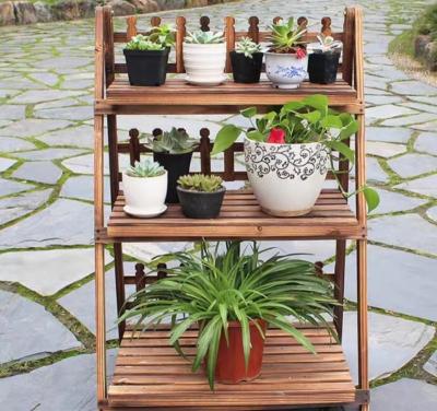 China Retro Style Flower Potted Plant Stand Planter Rack Ladder Foldable Garden Balcony Potted Wooden Planter Stand for sale