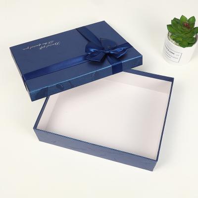 China Handmade luxury gift packaging blue gift boxes with ribbon and paper bag for sale