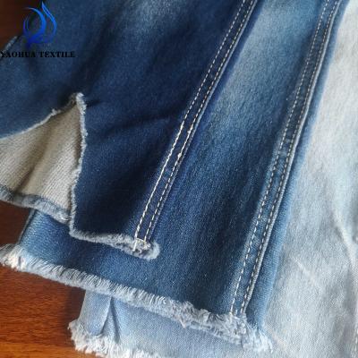 China 2123 Indigo weave anti-static cheap price cotton polyester elastic satin denim fabric for man and lady jeans for sale