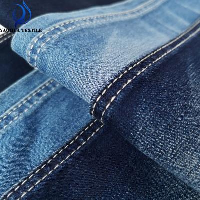 China 028 anti-static satin jeans fabric 9oz cotton polyester selvedge denim fabric with low price for sale