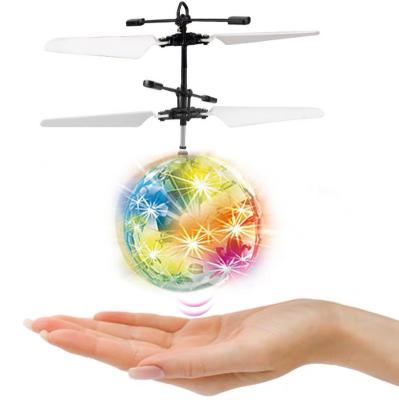 China Induction Toy Flying Ball For Children Game With Flashing Light Crystal Ball Inductive Planes for sale