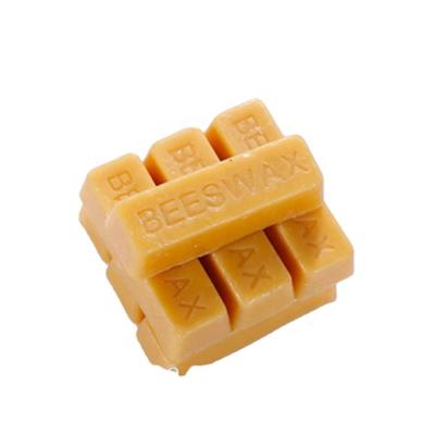 China Wholesale pure natural high quality beeswax bar low price food pharmacy cosmetics raw material in china for sale