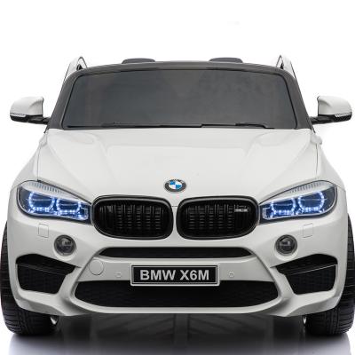 China Ride On Toy Stroller Baby BMW X6M Licensed Wholesale License 12V Ride On Car Battery Operated Children Baby Kids Electric Toy Vehicle For Sale RC Stunt Car Car for sale