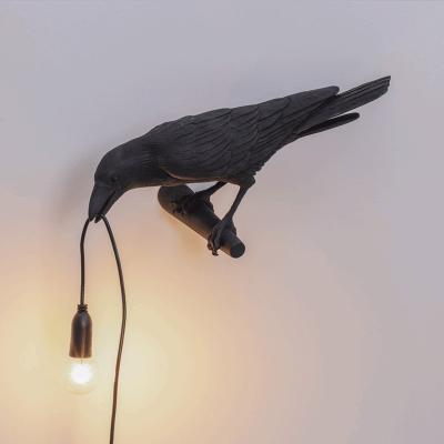 China Modern Wholesale Hotel Wall Light Creative Lucky Bird Lamps Anime Wall Light Raven Resin LED Wall Lamp for sale