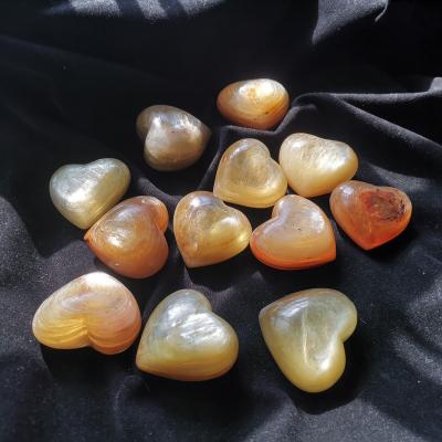 China Europe Real Lepidolite Yellow Heart Healing Natural Gold Carved Spiritual Ornaments for sale