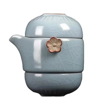 China The one viable pot and two cups of portable Kung Fu tea sets are featured with stainless steel filter bladder for sale