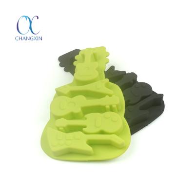 China Sustainable Hot Sale Food Grade Bakeware DIY Guitar Shape Silicone Candle Shapes for sale