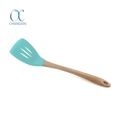 China Sustainable Non Toxic Durable Universal Kitchen Utensil Silicone Slotted Turner for sale