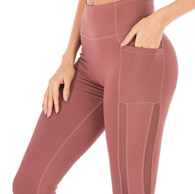 China Newest Antibacterial Women Compression Pants Mesh Gaiters With Pocket Tight Active Pants For Fitness Gym for sale