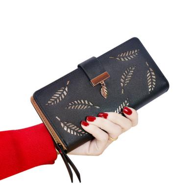 China Waterproof factory directly sell fashion pu leather wallet woman wallet along with hollow leaves wholesale for sale