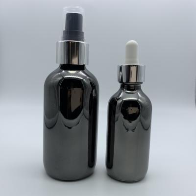 China 10ml 15ml 20ml 30ml 50ml 100ml Boston Round Glass Bottle Essential Oil Electroplating Bottle With Pipette Dropper for sale