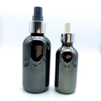 China Manufacture Essential Oil Cosmetic Solid Black Luxury Electroplating Glass Bottle for sale