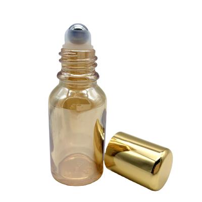 China High end luxury cosmetic gold 30ml essential oil roller glass bottle can print logo on the bottle for sale