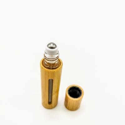 China 1ml 2ml Small Shell Roller Essential Oil Cosmetic Luxury High Quality Wooden Glass Vial for sale